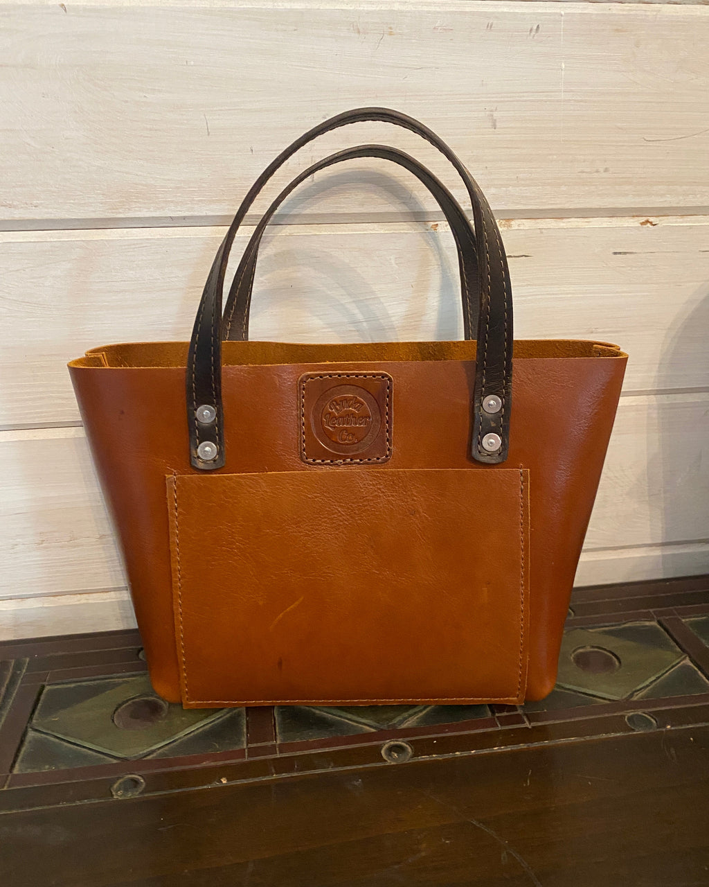 Saddle brown handmade full-grain leather medium tote bag by Buda Leather